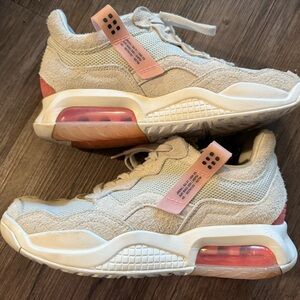 Air Jordan Cream and Pink Athletic Shoes